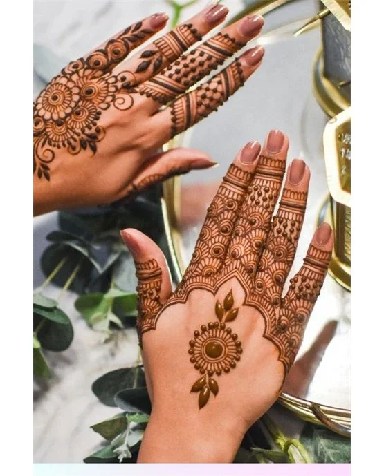 Soft Twist With Loop Covering Back Hand Mehndi Design